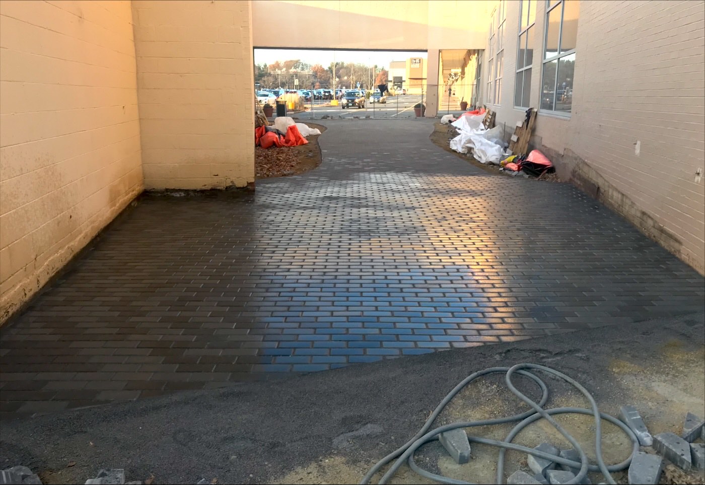 The same corridor finished in charcoal clay pavers